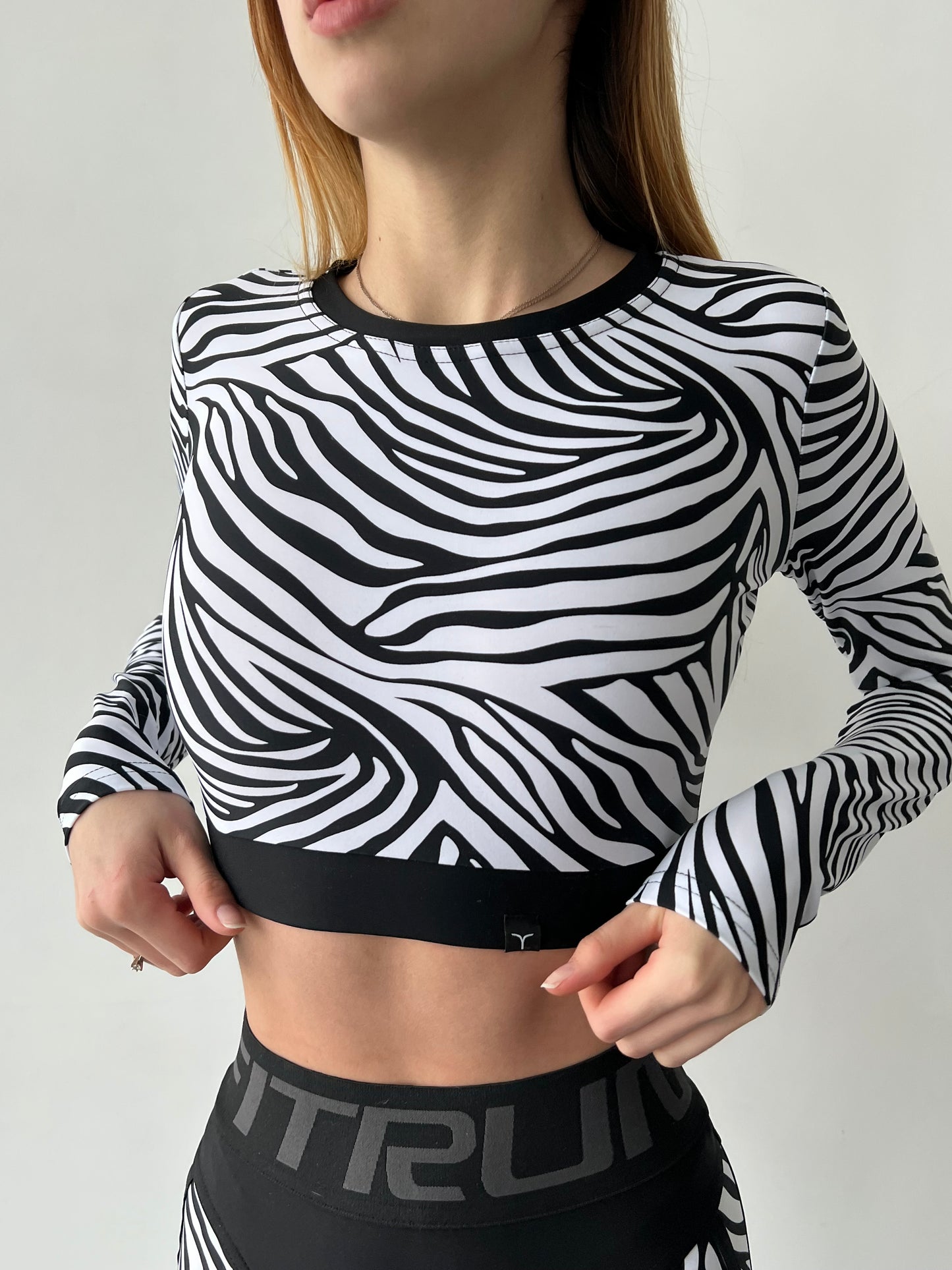 Sportinis topas ilgomis rankovėmis „Zebra“